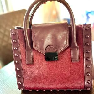 The Loeffler Randall Junior Work Tote in burgundy pony hair